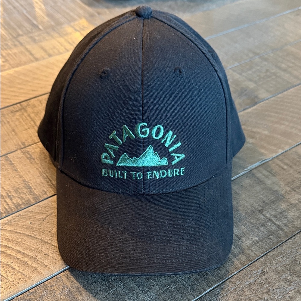 Patagonia Black Hat with Green Logo